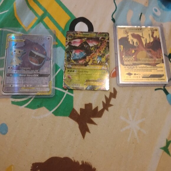 I'm selling these pokemon cards (golden Charizard V Gengar&mimikyu GX tag team) - Picture 1 of 4